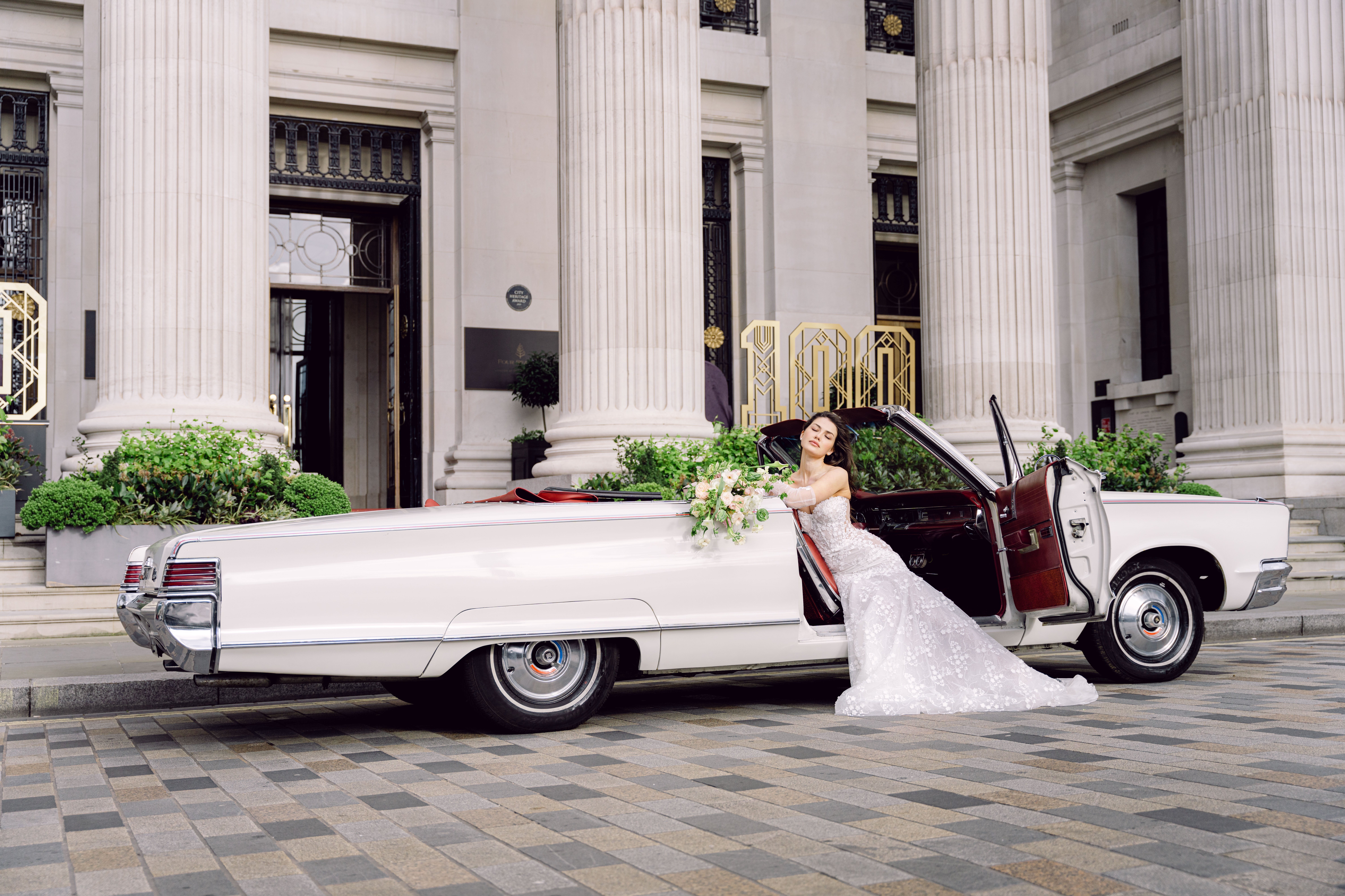 Fine art editorial bride shot in a vintage car